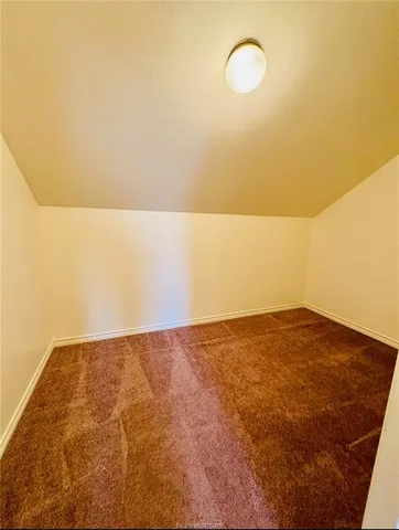 a view of balcony with wooden floor