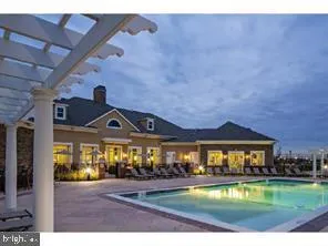 a view of a house with a big yard