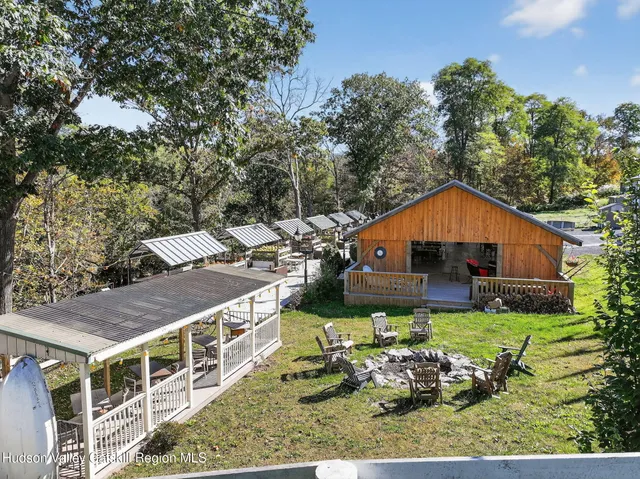 a view of a tables and chairs in patio