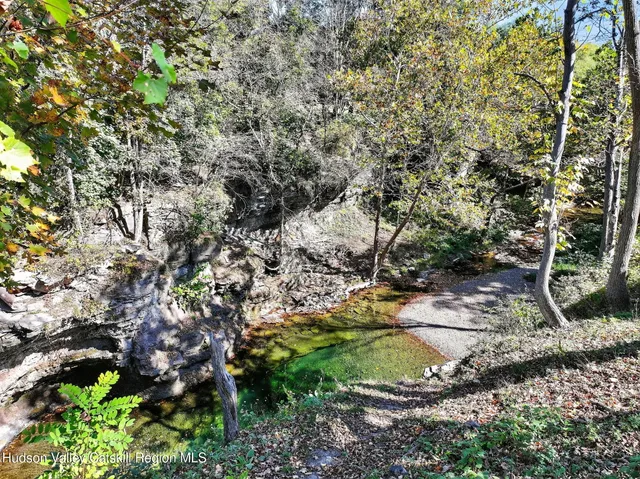 a view of a chairs and table in a patio