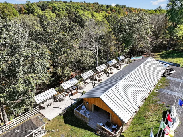 a bathroom with a toilet a sink and shower