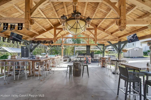 a bathroom with a toilet a sink and shower