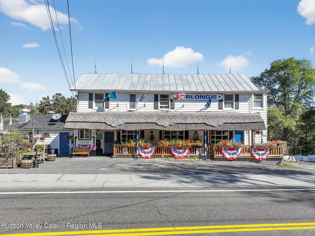 a front view of building with street
