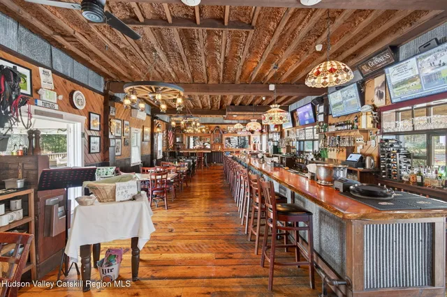 a view of a chairs and table in a patio