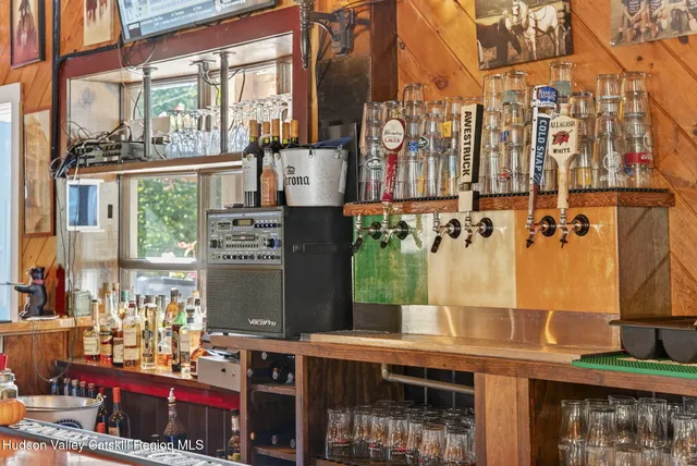 a view of a dining room with furniture chandelier and mountain view