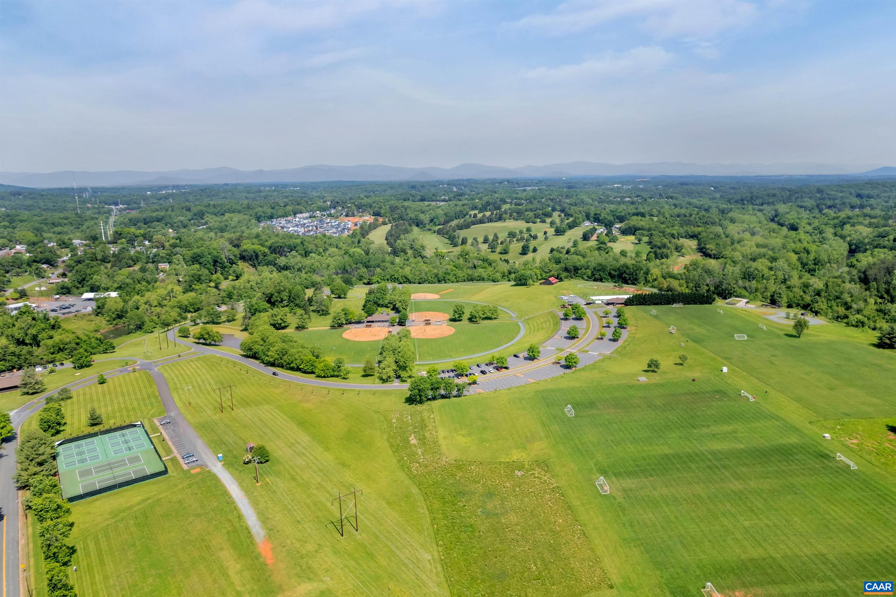 2021 Via Florence Road Charlottesville, VA 22911 - Photo 60 of 60 an aerial view of residential houses with outdoor space and trees