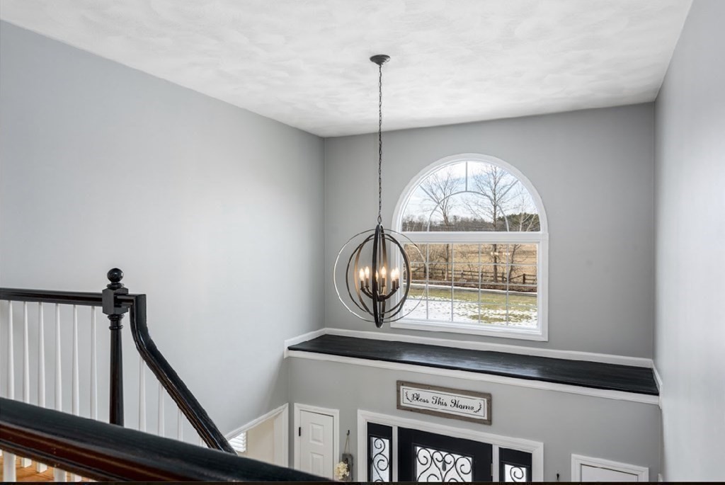 11 Woodman Road Amesbury, MA 01913 - Photo 18 of 31 a view of fireplace with wooden floor