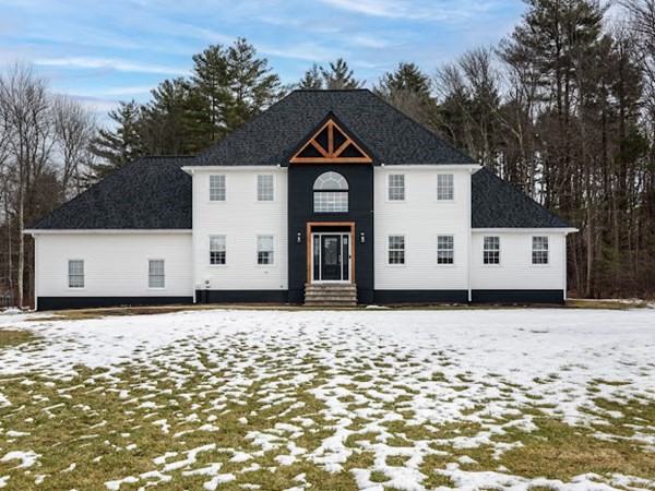 11 Woodman Road Amesbury, MA 01913 - Photo 2 of 31 a front view of a house with a yard