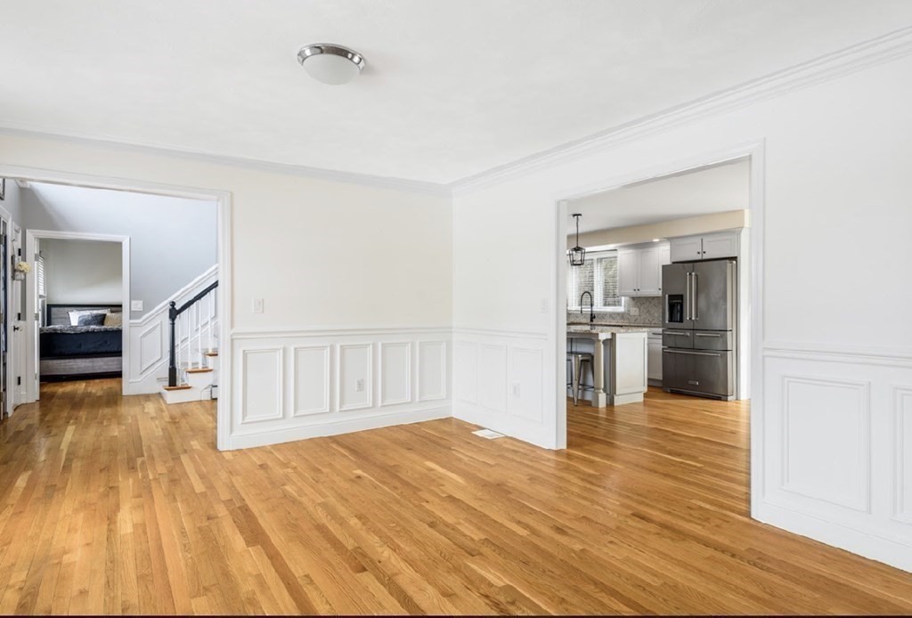 11 Woodman Road Amesbury, MA 01913 - Photo 25 of 31 a view of a kitchen with wooden floor and a kitchen
