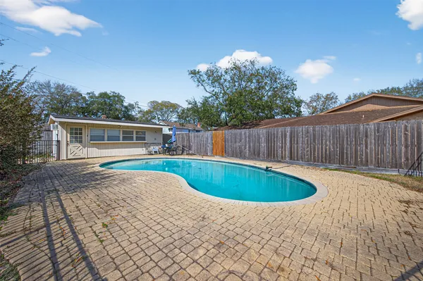 a view of outdoor space and swimming pool