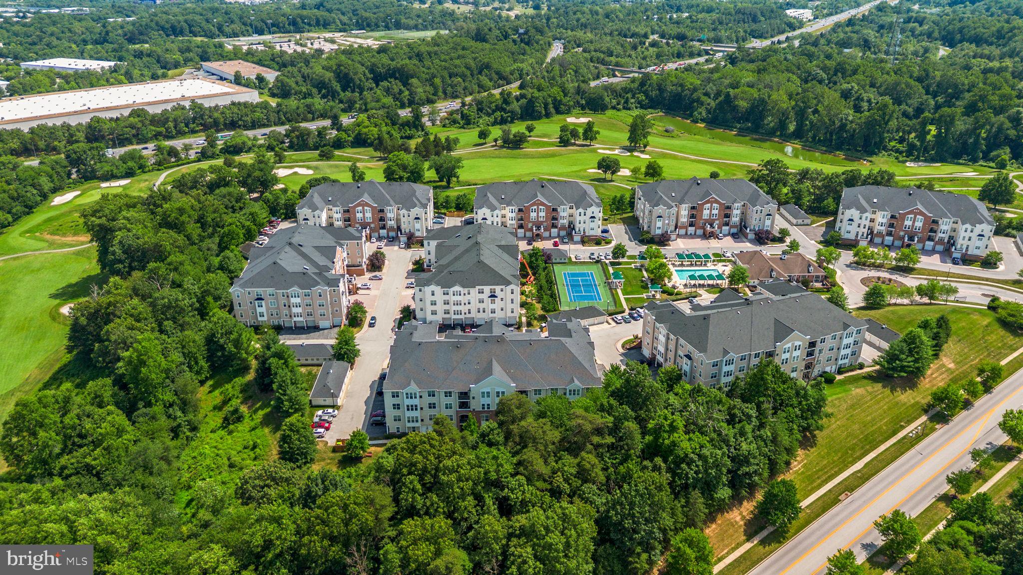 7315 Maplecrest Road, Unit 104 Elkridge, MD 21075 - Photo 56 of 58 an aerial view of a house with a garden