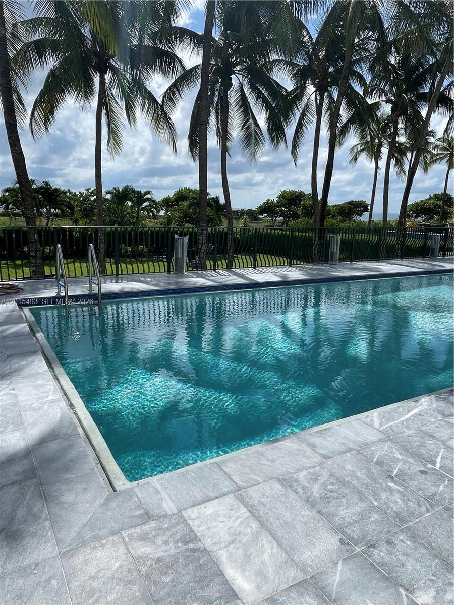 9195 Collins Avenue, Unit 1012 Surfside, FL 33154 - Photo 18 of 27 a view of lake