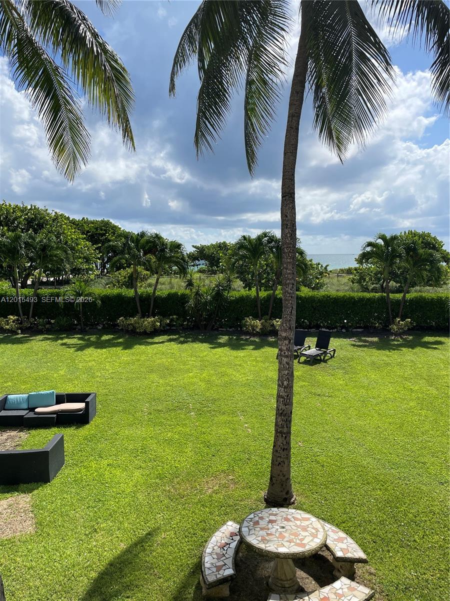 9195 Collins Avenue, Unit 1012 Surfside, FL 33154 - Photo 23 of 27 a view of a lake with a big yard