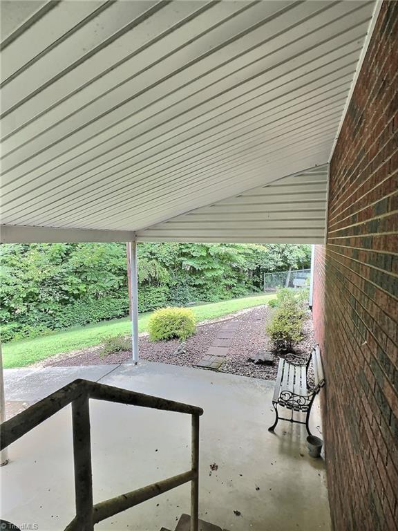 5096 Highway 16 Moravian Falls, NC 28654 - Photo 36 of 43 Covered Sitting Area off Garage