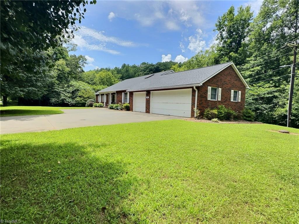 5096 Highway 16 Moravian Falls, NC 28654 - Photo 43 of 43 Driveway offers ample parking area