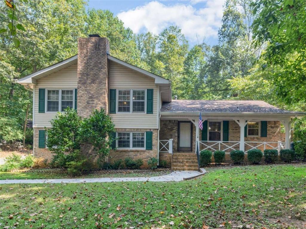 8294 Winston Way Jonesboro, GA 30236 - Photo 2 of 67 a front view of house with yard and green space