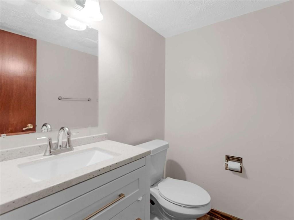 8294 Winston Way Jonesboro, GA 30236 - Photo 33 of 67 a bathroom with a sink a toilet and mirror