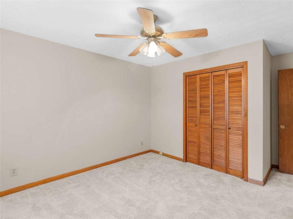 8294 Winston Way Jonesboro, GA 30236 - Photo 41 of 67 an empty room with a ceiling fan and a window