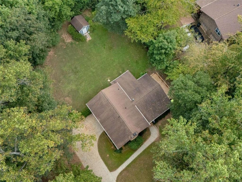 8294 Winston Way Jonesboro, GA 30236 - Photo 63 of 67 an aerial view of a house with a yard and lake view