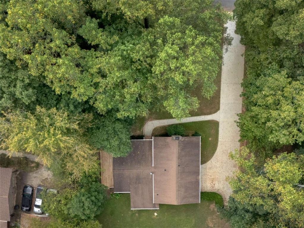 8294 Winston Way Jonesboro, GA 30236 - Photo 66 of 67 an aerial view of a house with outdoor space and trees all around