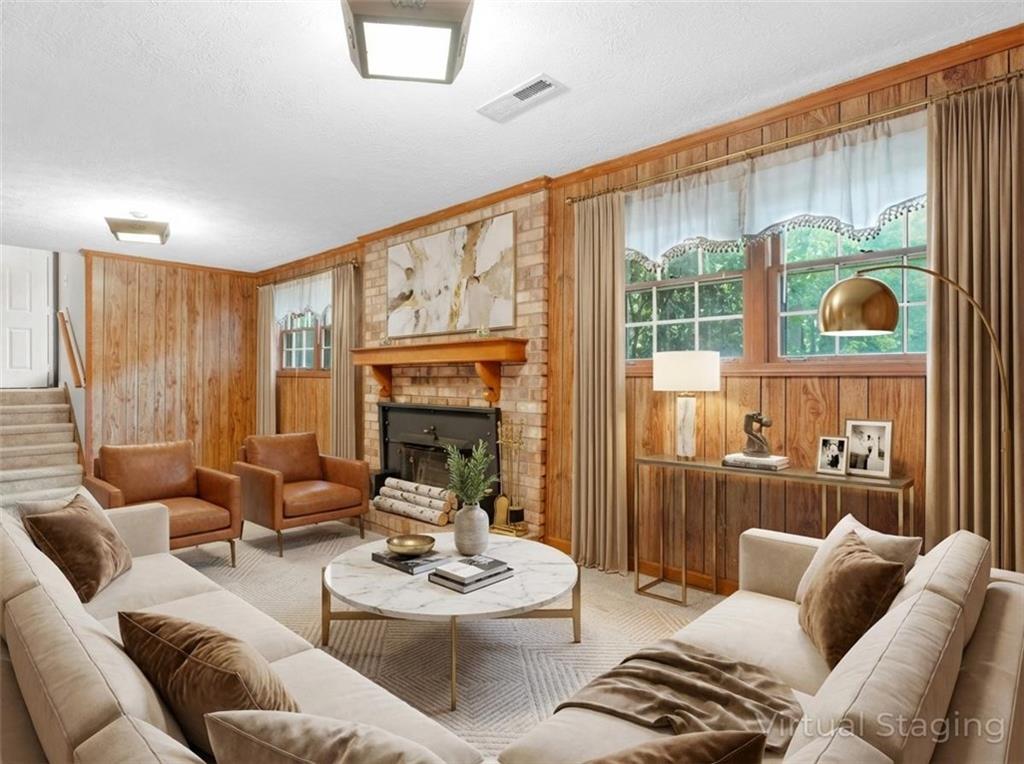 8294 Winston Way Jonesboro, GA 30236 - Photo 10 of 67 a living room with furniture and a fireplace