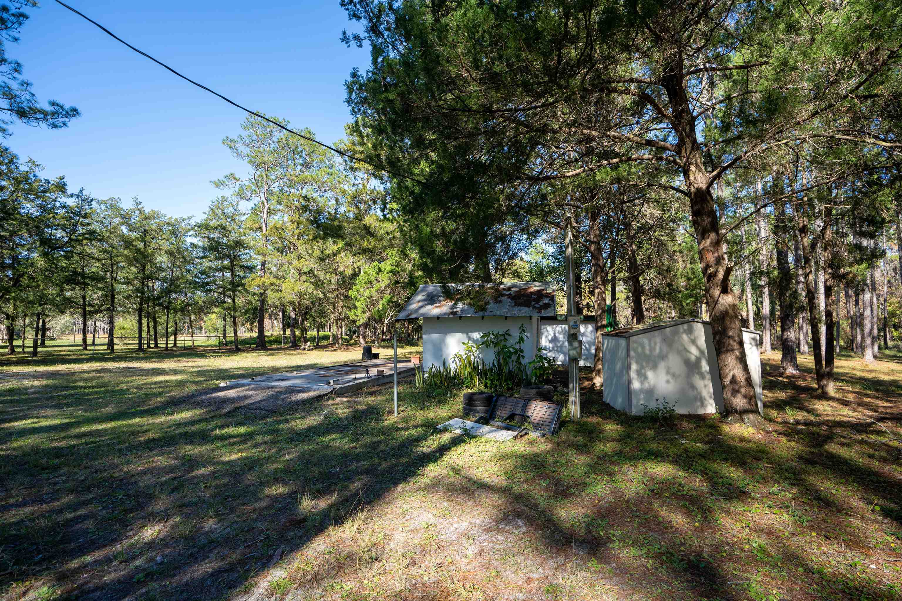 2780-land) Pellicer Road St. Augustine, FL 32092 - Photo 3 of 6 a backyard of a house with table and chairs