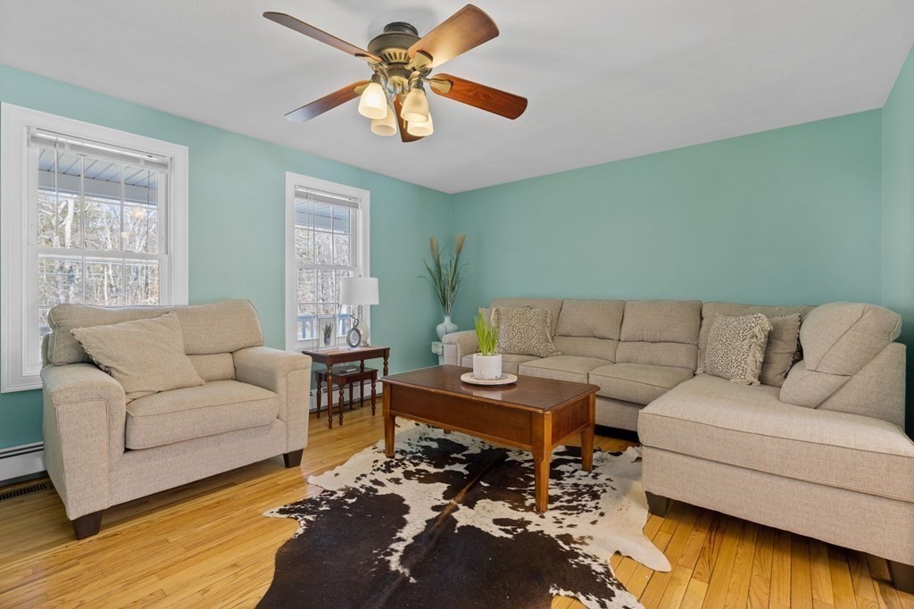 37 Lincoln Street Norton, MA 02766 - Photo 11 of 42 a living room with furniture and a wooden floor