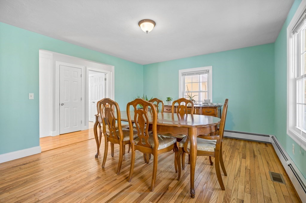 37 Lincoln Street Norton, MA 02766 - Photo 14 of 42 a view of a dining room with furniture and wooden floor
