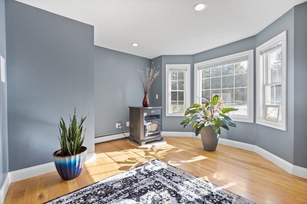 37 Lincoln Street Norton, MA 02766 - Photo 19 of 42 a view of a living room and a potted plant