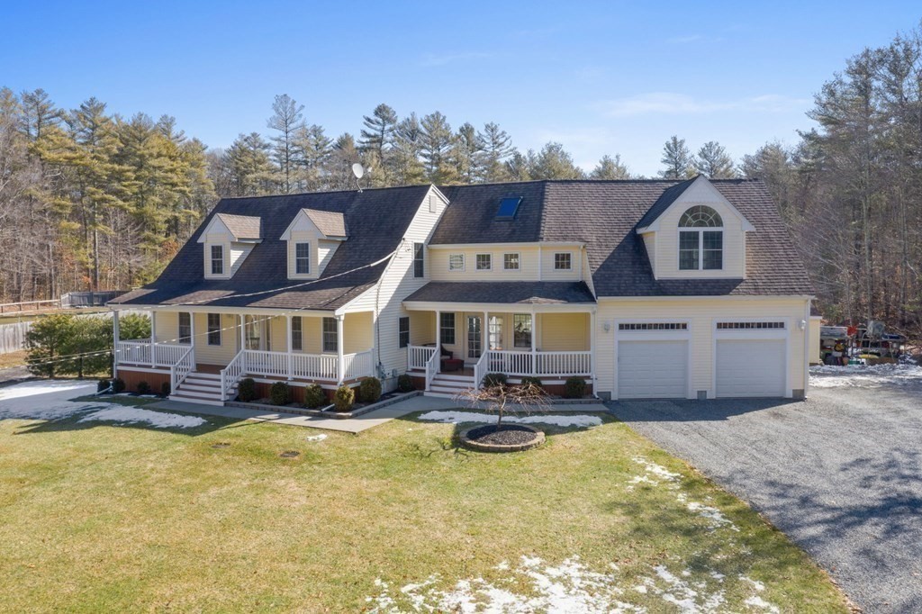37 Lincoln Street Norton, MA 02766 - Photo 32 of 42 a aerial view of a house with swimming pool and furniture