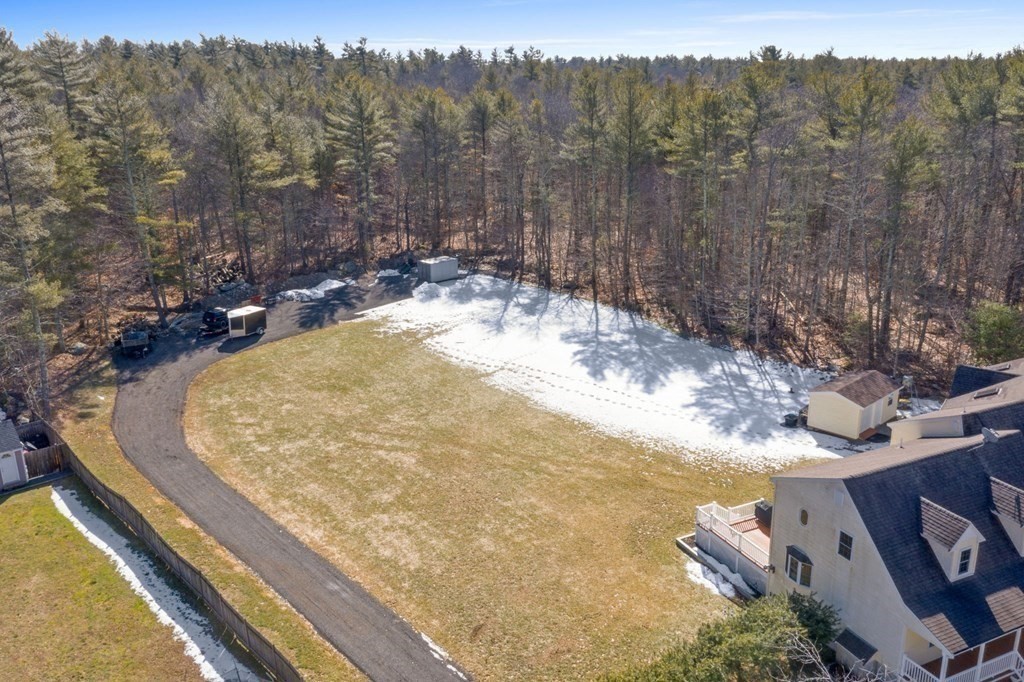 37 Lincoln Street Norton, MA 02766 - Photo 37 of 42 a view of a backyard with mountain view