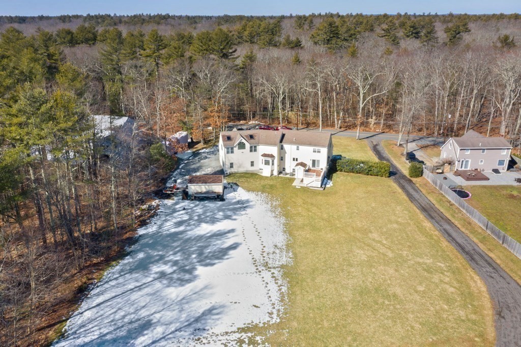 37 Lincoln Street Norton, MA 02766 - Photo 40 of 42 a view of a swimming pool with an outdoor seating area