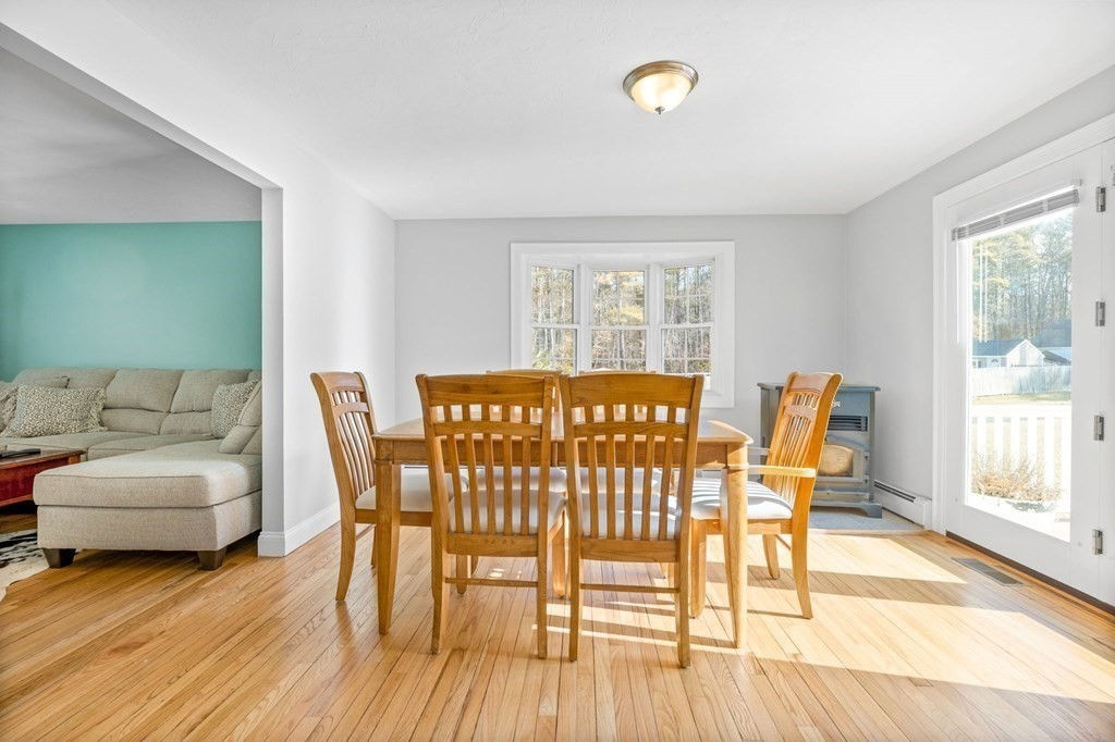 37 Lincoln Street Norton, MA 02766 - Photo 8 of 42 a view of a dining room with furniture and wooden floor