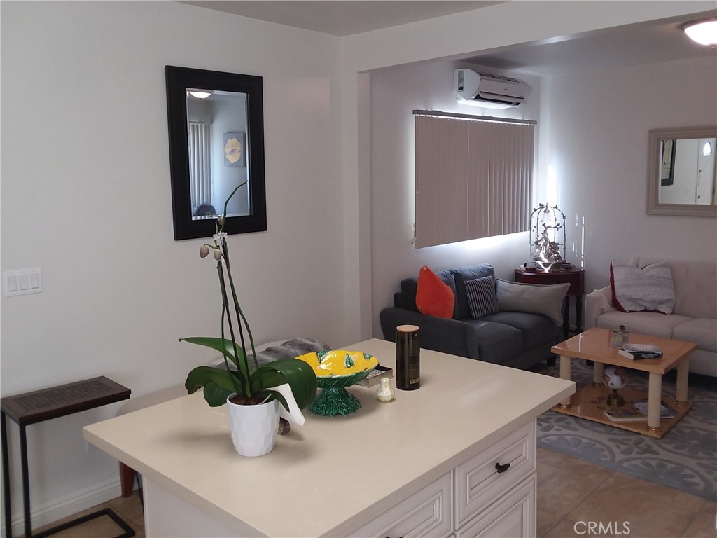 3810 West Heffron Drive, Unit B Burbank, CA 91505 - Photo 5 of 12 a living room with furniture and potted plant