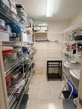 a kitchen with appliances and cabinets