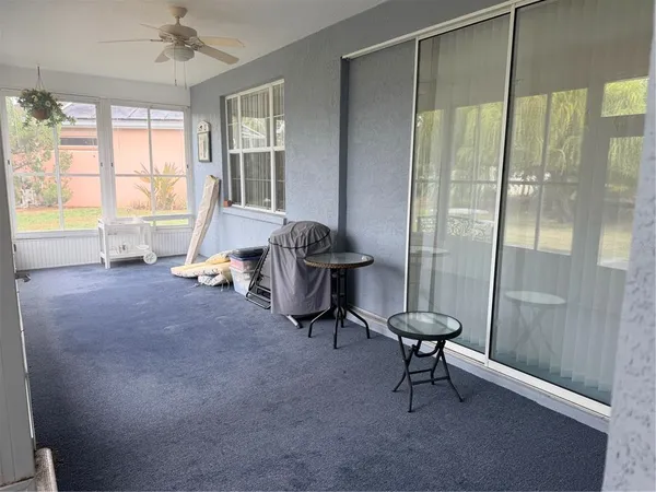 a view of a patio with chair and table on the patio