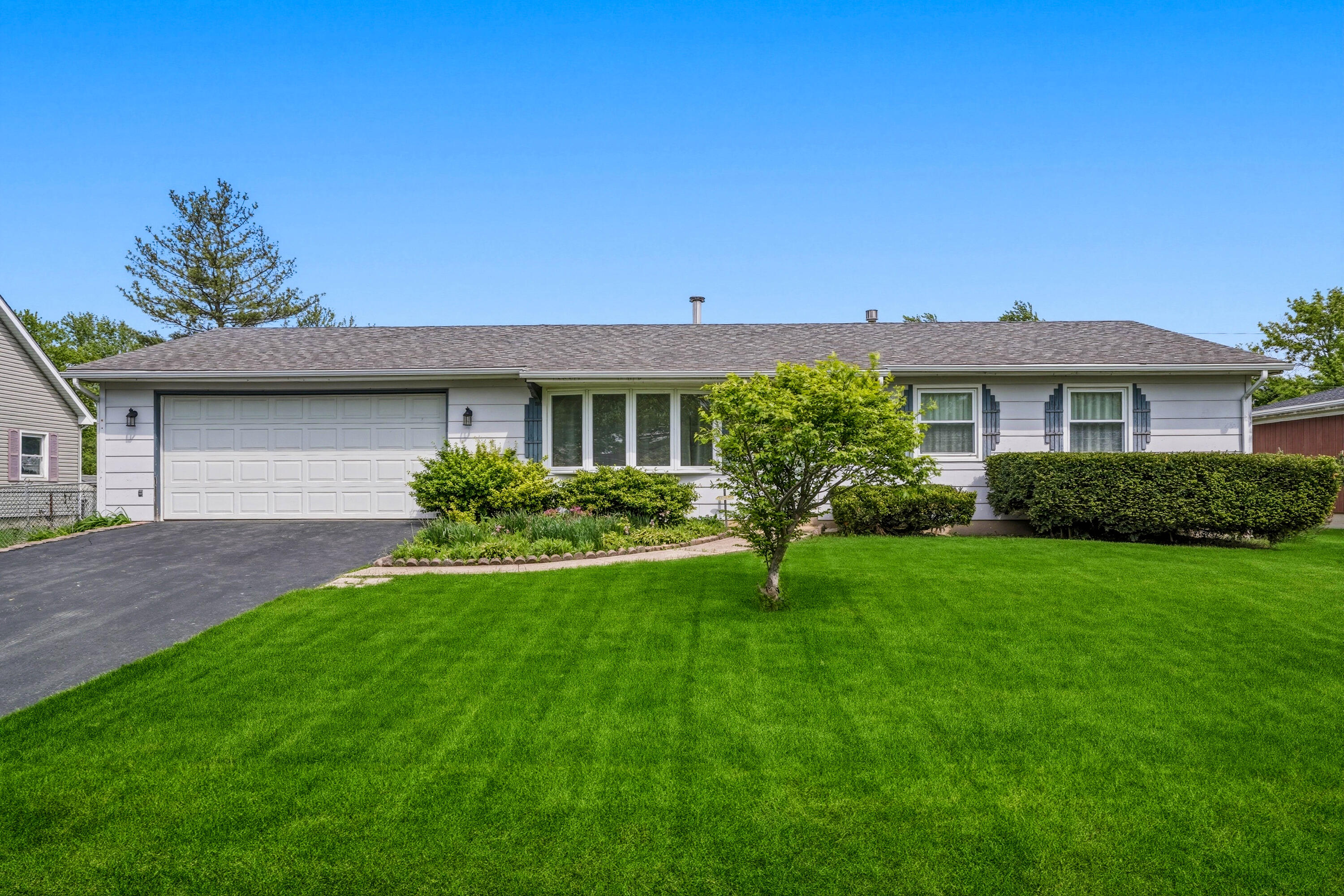 627 Olympia Road Valparaiso, IN 46385 - Photo 1 of 19 a view of a house with a yard