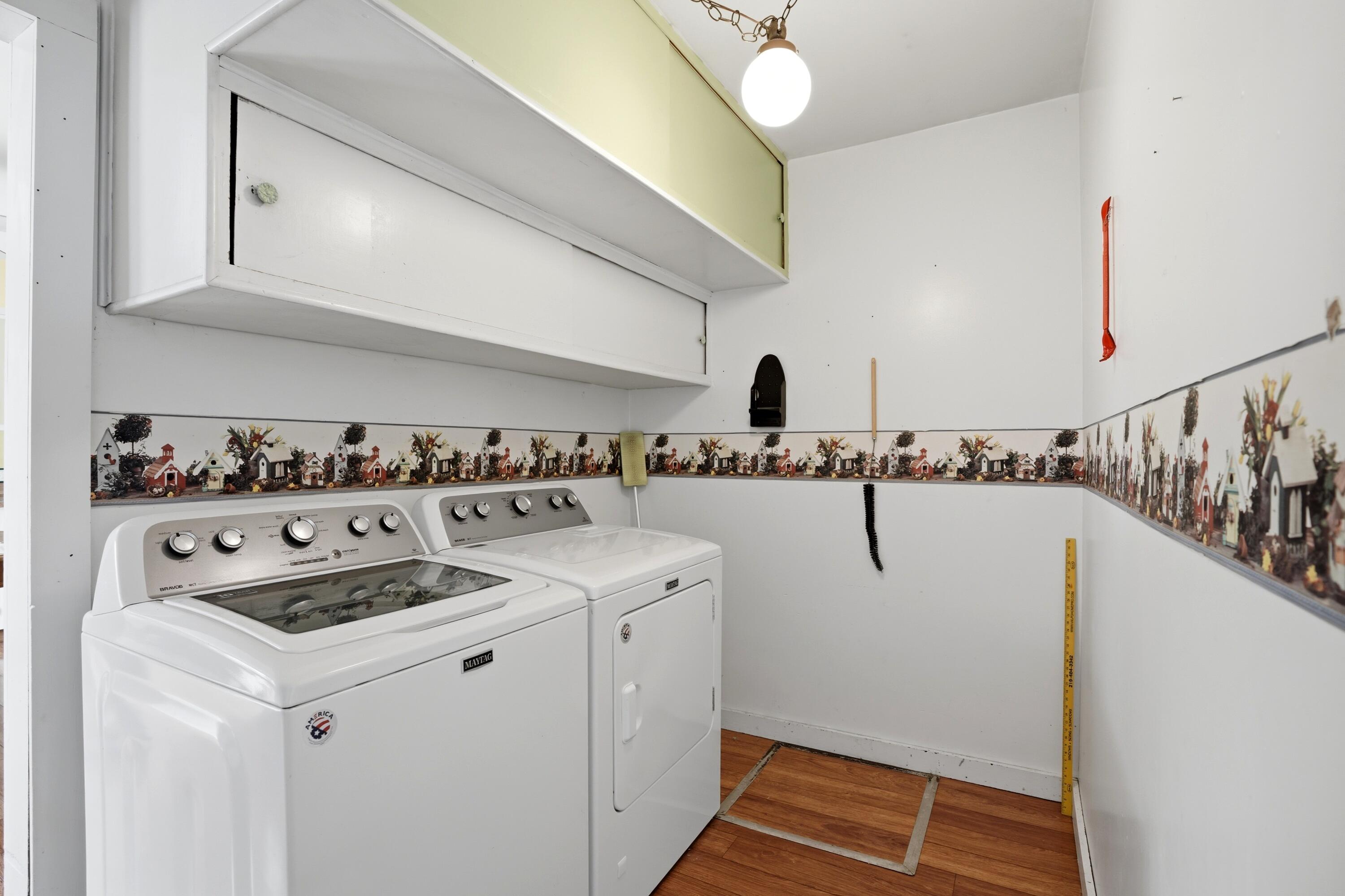 627 Olympia Road Valparaiso, IN 46385 - Photo 11 of 19 a utility room with sink dryer and washer