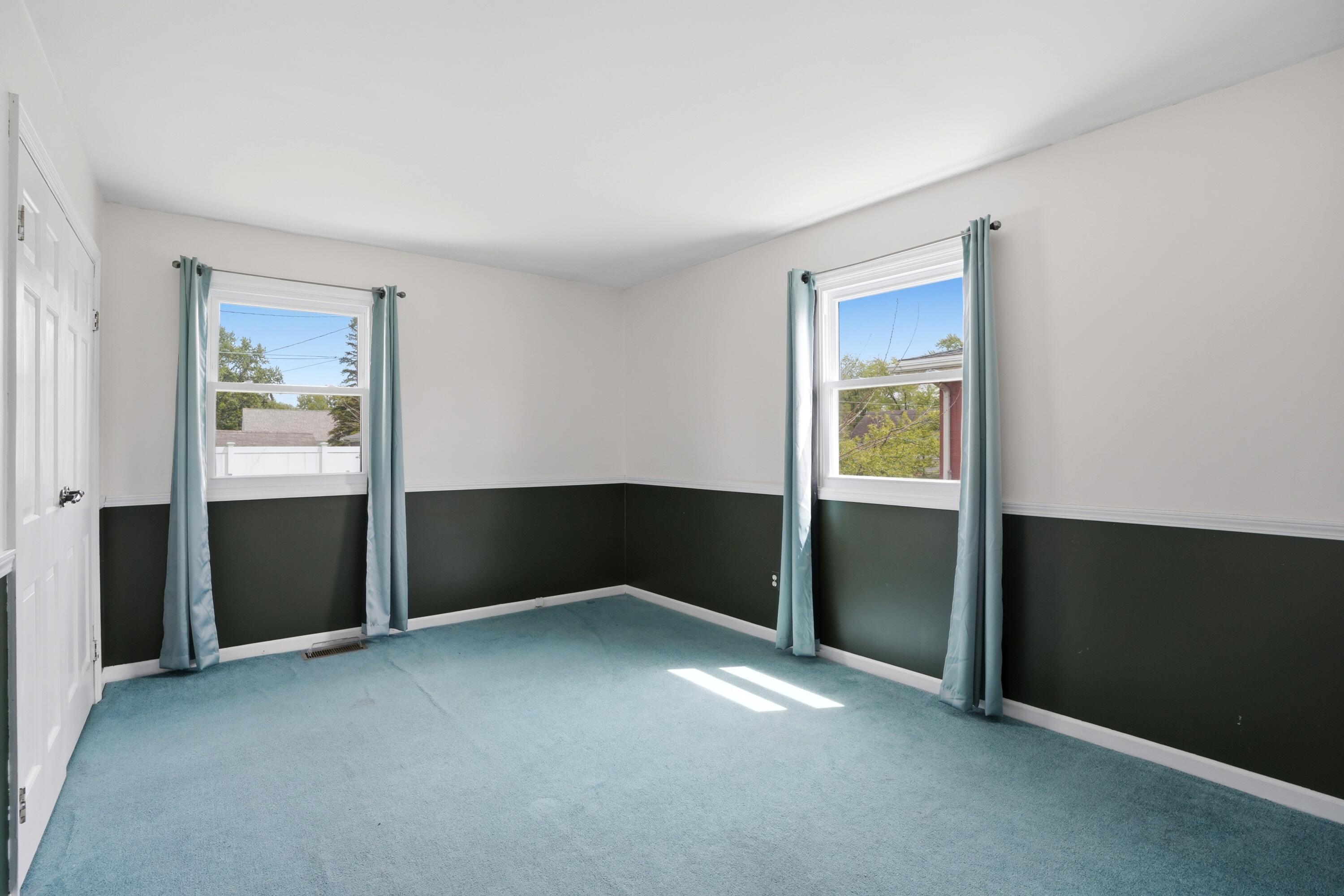 627 Olympia Road Valparaiso, IN 46385 - Photo 13 of 19 a view of an empty room with closet and a window