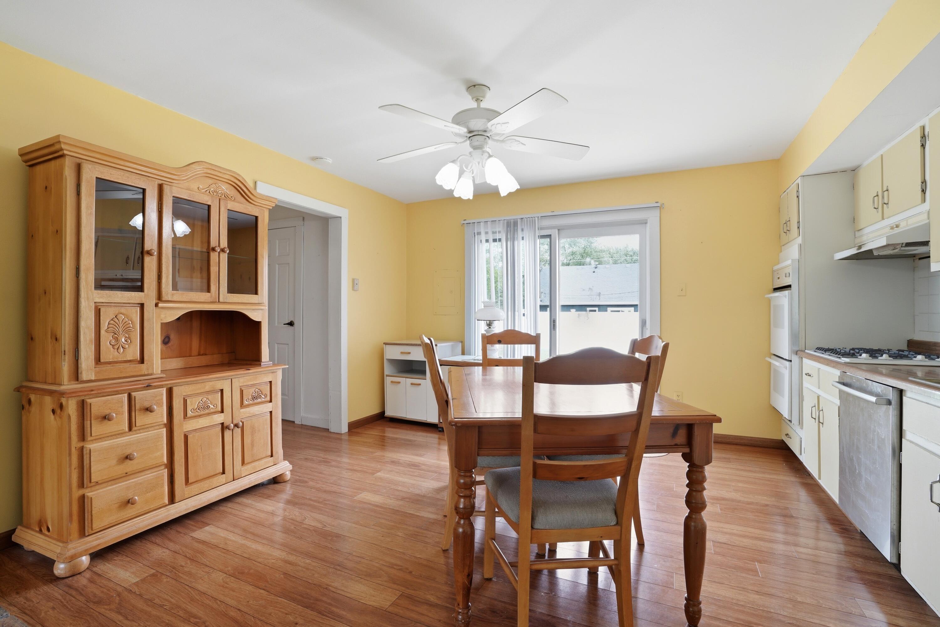 627 Olympia Road Valparaiso, IN 46385 - Photo 9 of 19 a view of a dining room with furniture window and wooden floor