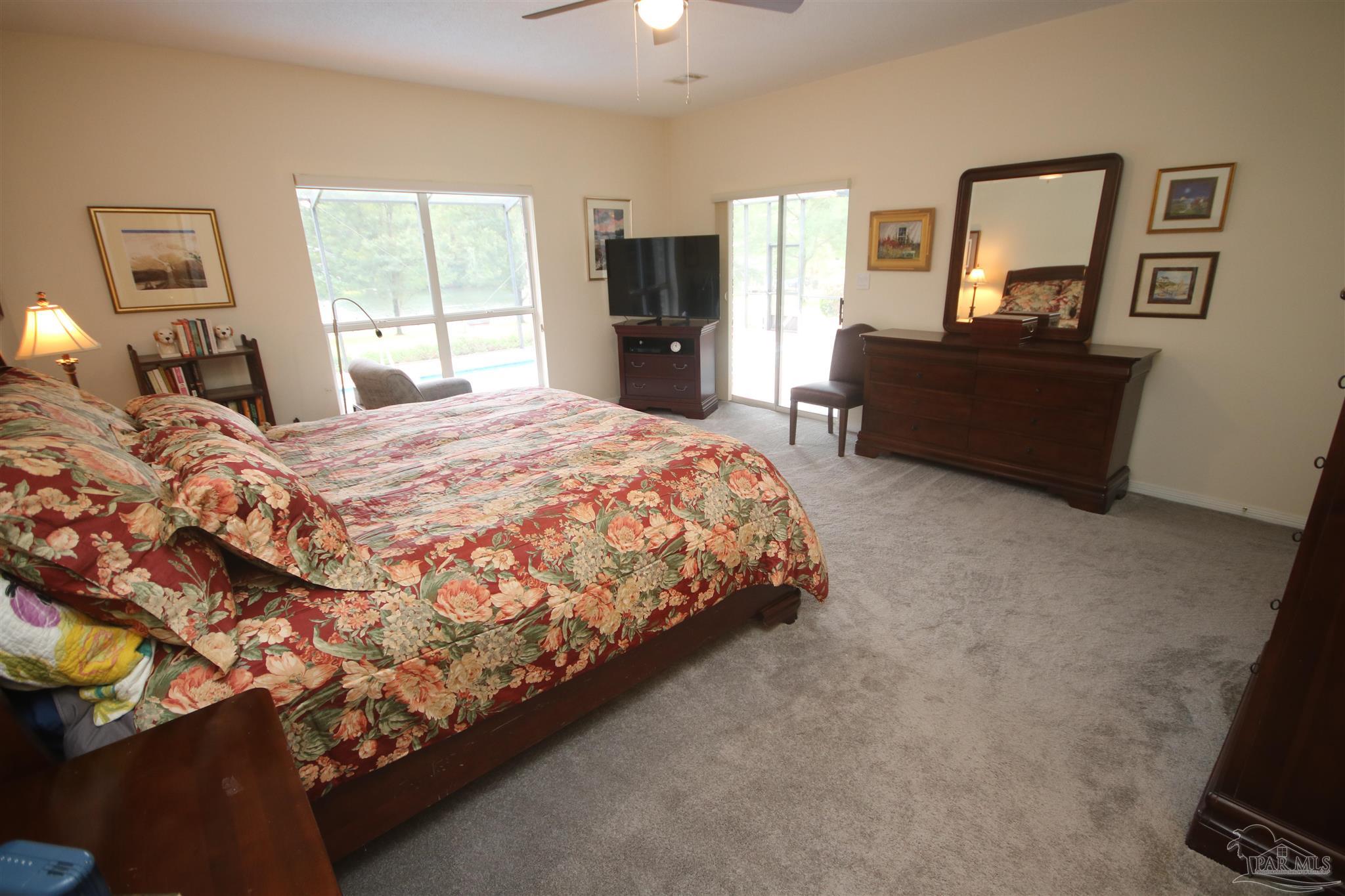 3286 Abel Avenue Pace, FL 32571 - Photo 24 of 55 king bed, dresser, chest & sitting area.