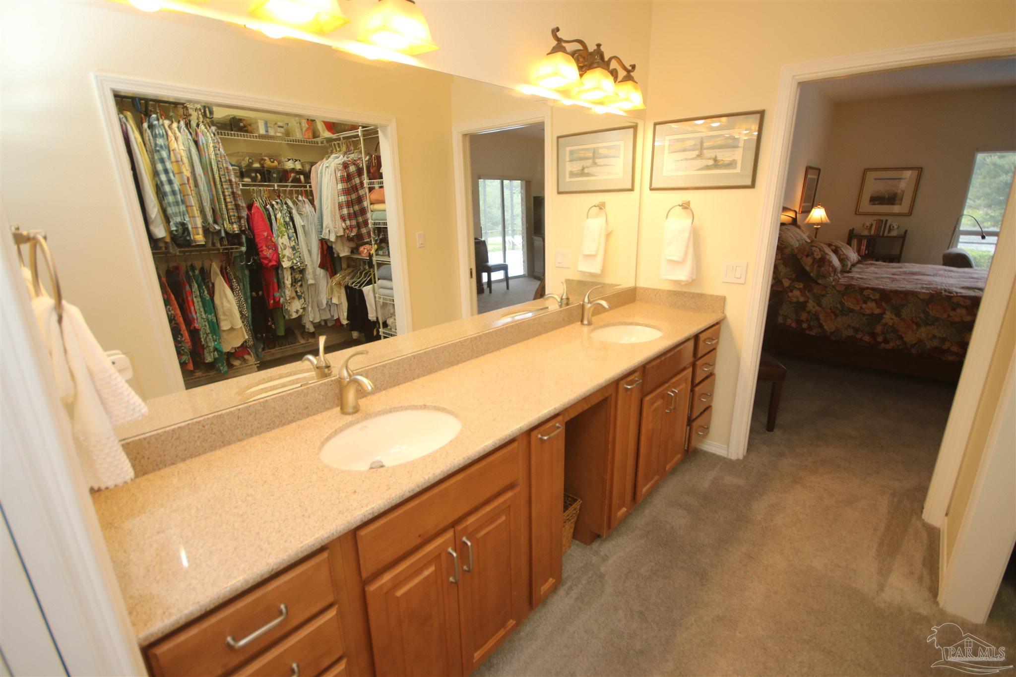 3286 Abel Avenue Pace, FL 32571 - Photo 26 of 55 cabinetry. Comfort height vanity.
