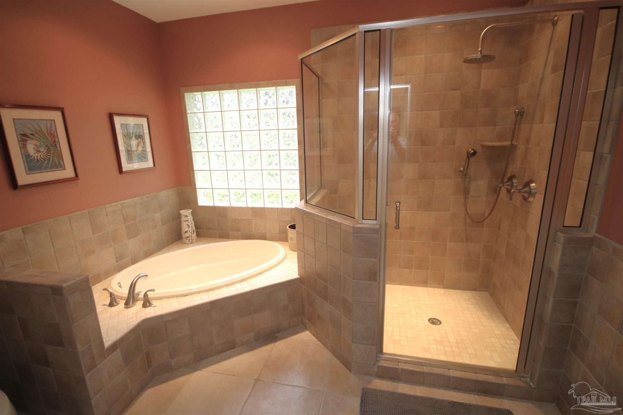 3286 Abel Avenue Pace, FL 32571 - Photo 28 of 55 tile wall. Block window for lots of natural light