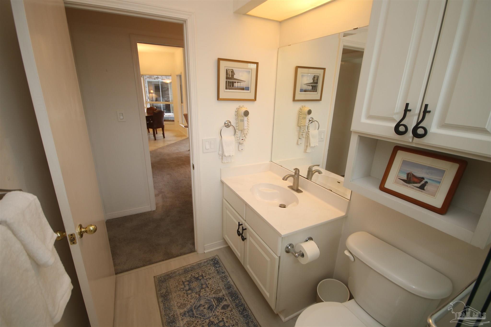 3286 Abel Avenue Pace, FL 32571 - Photo 39 of 55 top. New vinyl flooring June 2023.