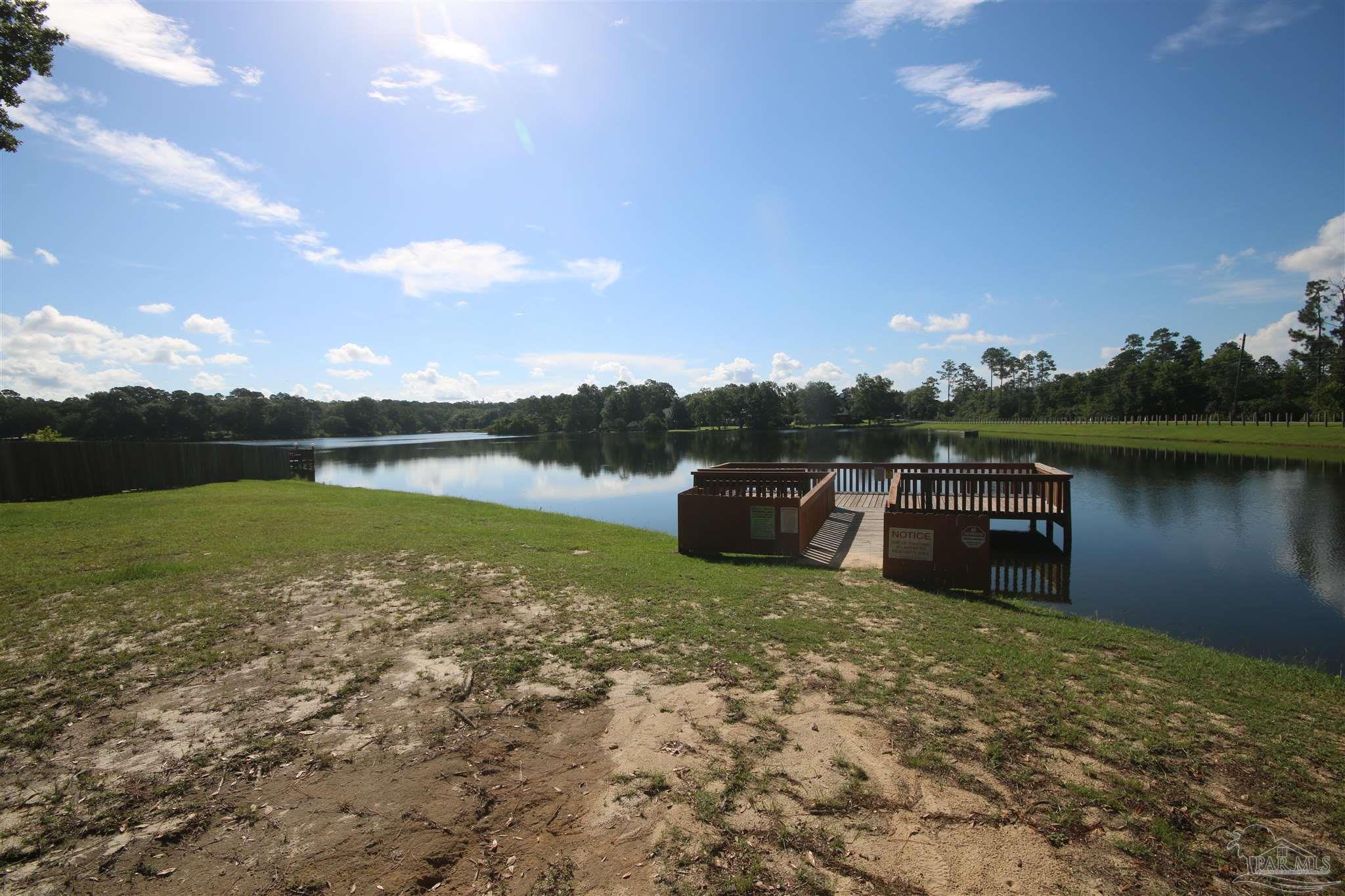 3286 Abel Avenue Pace, FL 32571 - Photo 46 of 55 for fishing or feeding carp or the turtles.
