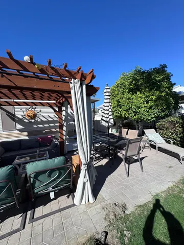 a view of a bench in the patio