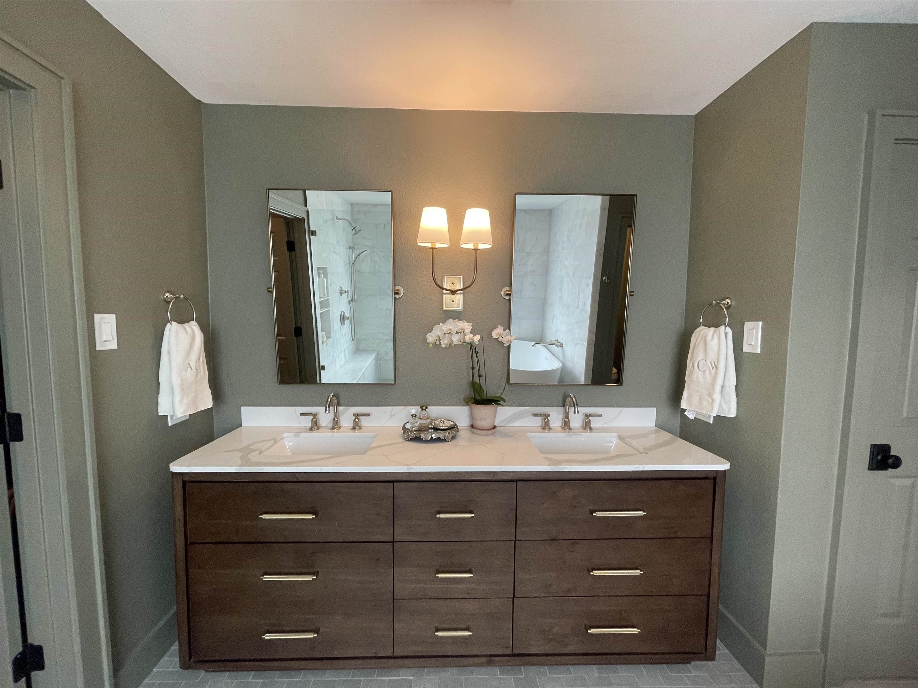 270 Chaparral Meadowlakes, TX 78654 - Photo 17 of 28 a bathroom with a double vanity sink and a mirror