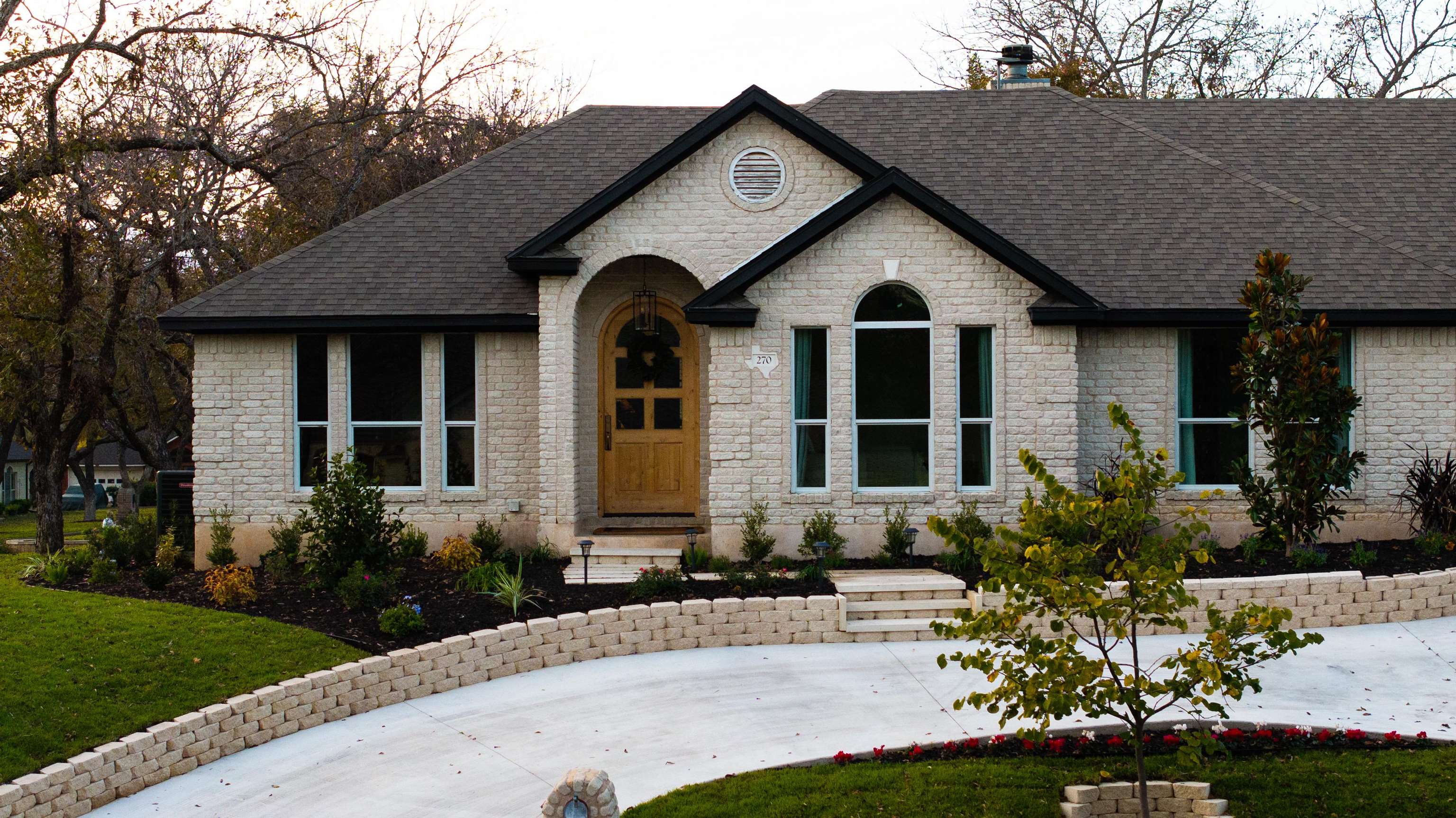270 Chaparral Meadowlakes, TX 78654 - Photo 2 of 28 a front view of a house with a yard