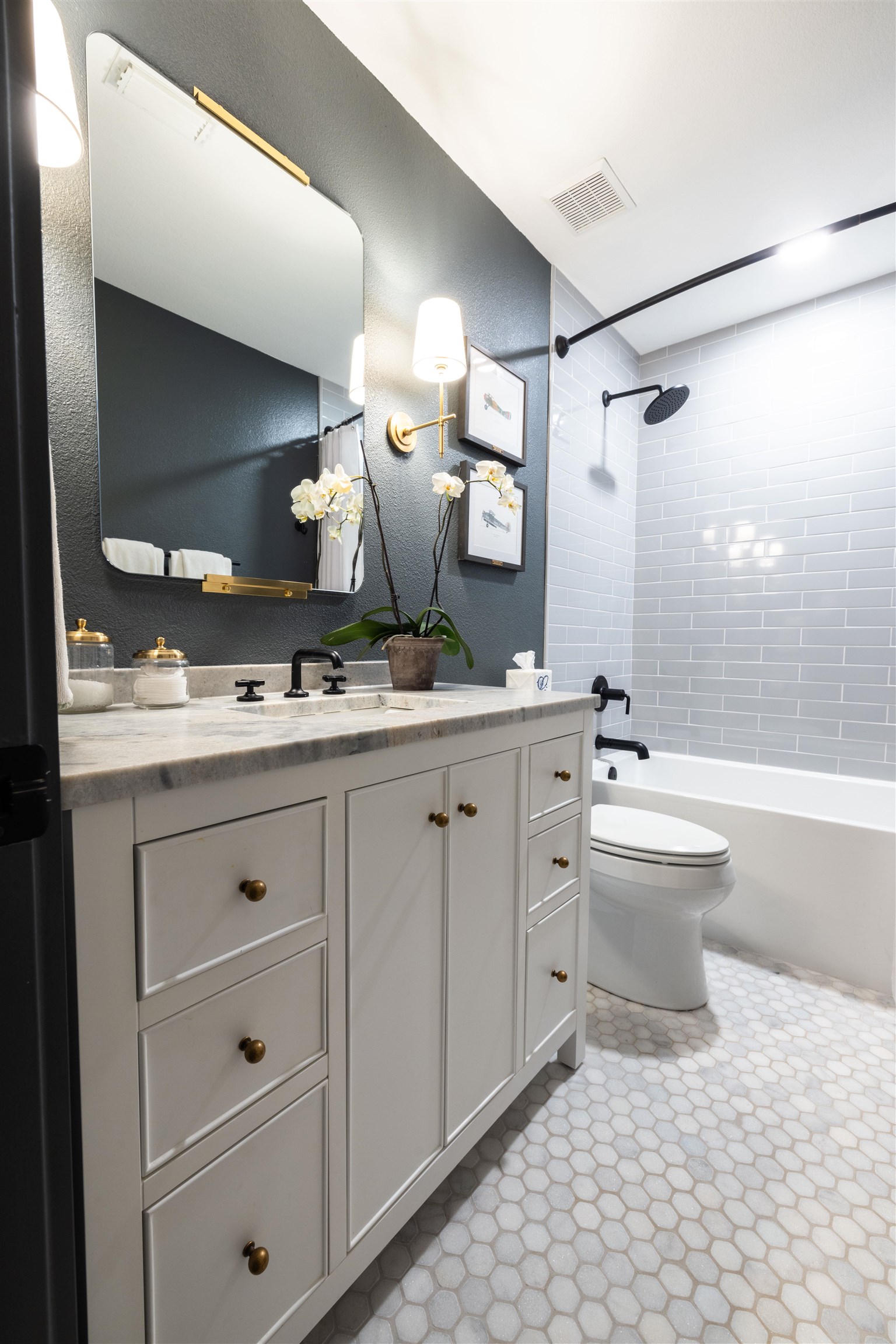 270 Chaparral Meadowlakes, TX 78654 - Photo 22 of 28 a bathroom with a sink a toilet and shower