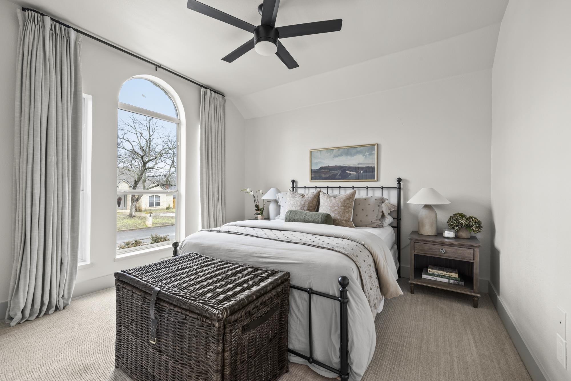 270 Chaparral Meadowlakes, TX 78654 - Photo 23 of 28 a bedroom with a bed and a window